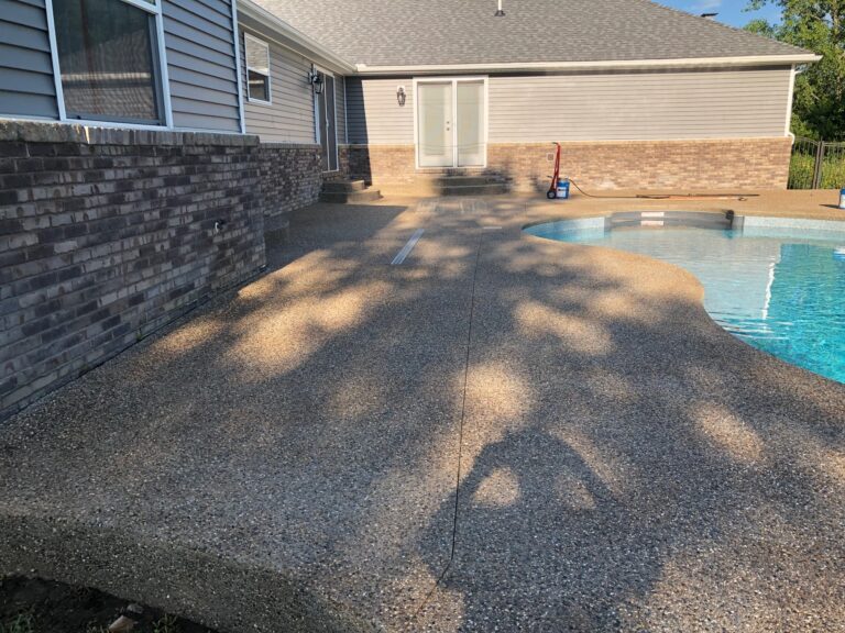 Exposed Aggregate Pool Deck in Clarkston , Mi Before Sealing