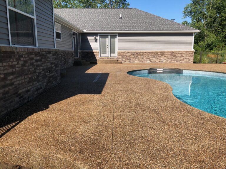 Exposed Aggregate Pool Deck in Clarkston , Mi After Sealing